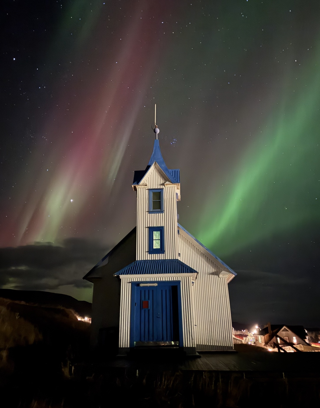 Northern lights above the front of Tiny Church